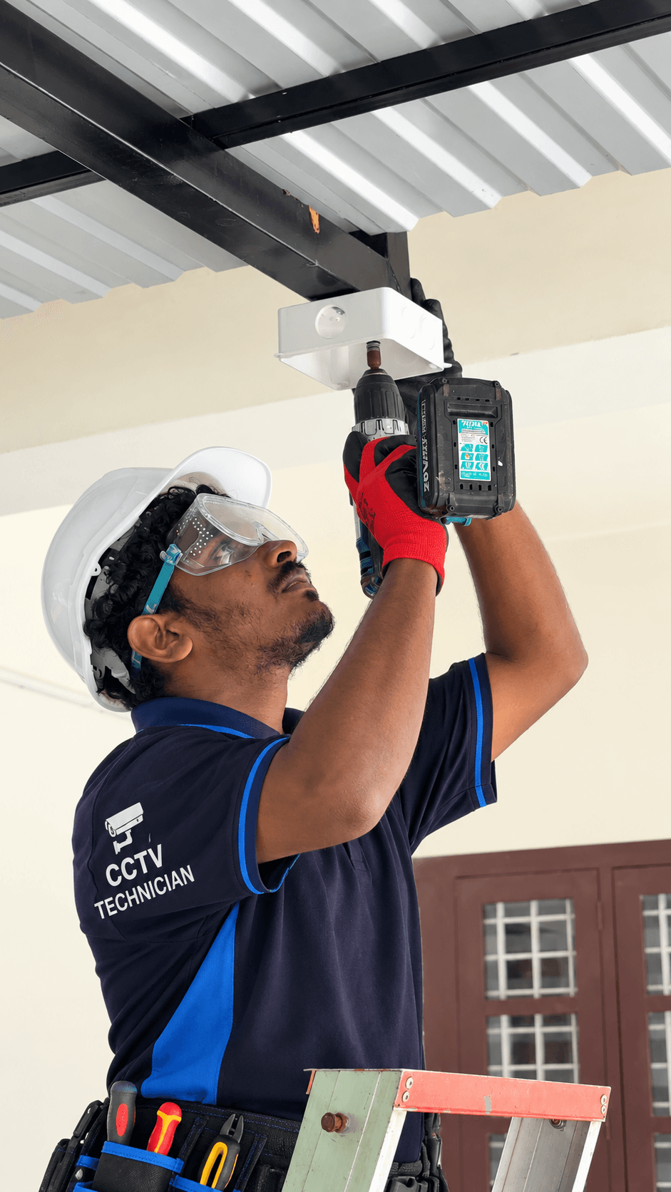 Outdoor weatherproof color night vision CCTV security camera mounted on building exterior in Kerala